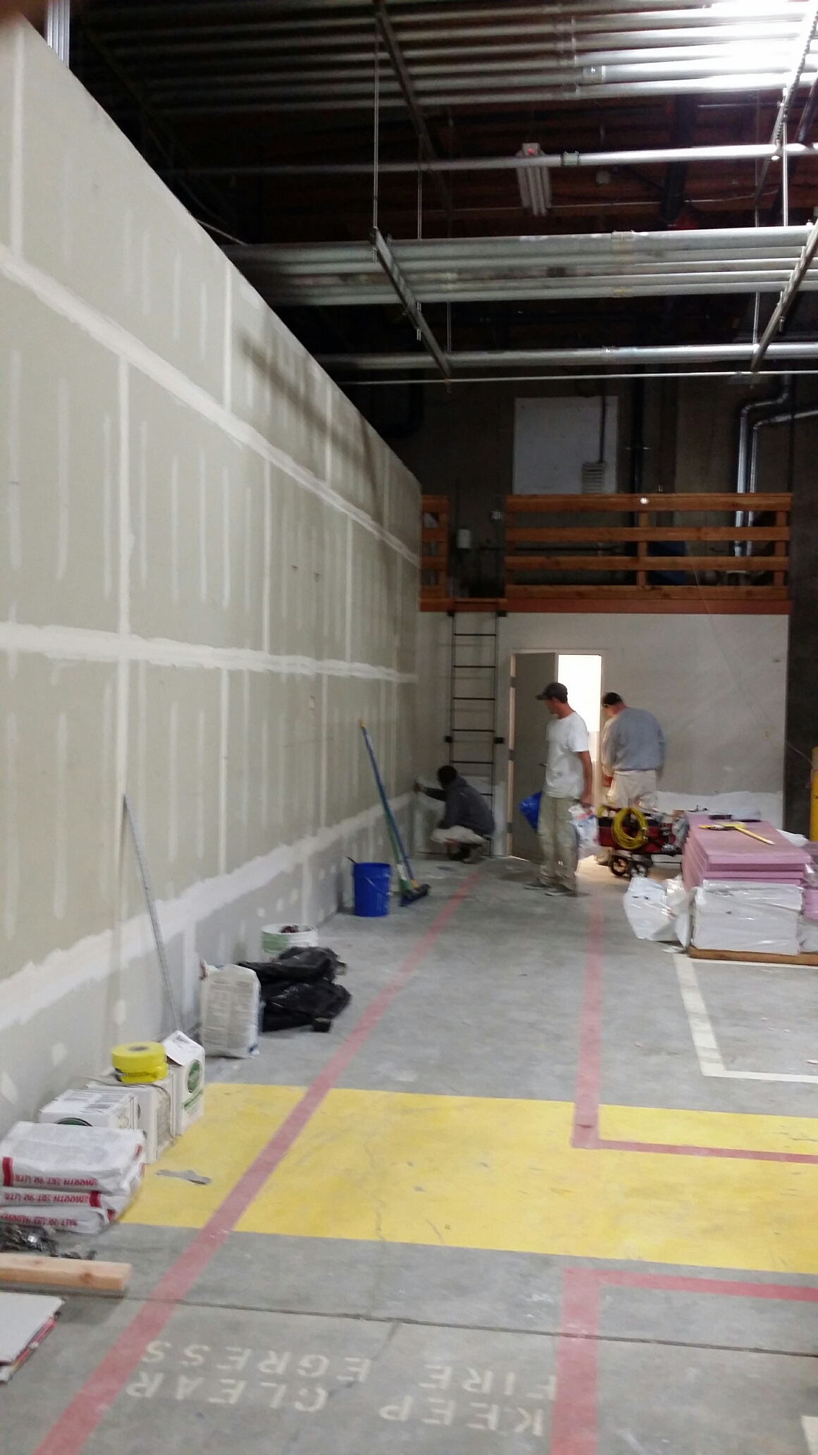 Interior commercial painting in Portland Oregon. Cascade painting and restoration. tenant improvement painting. warehouse